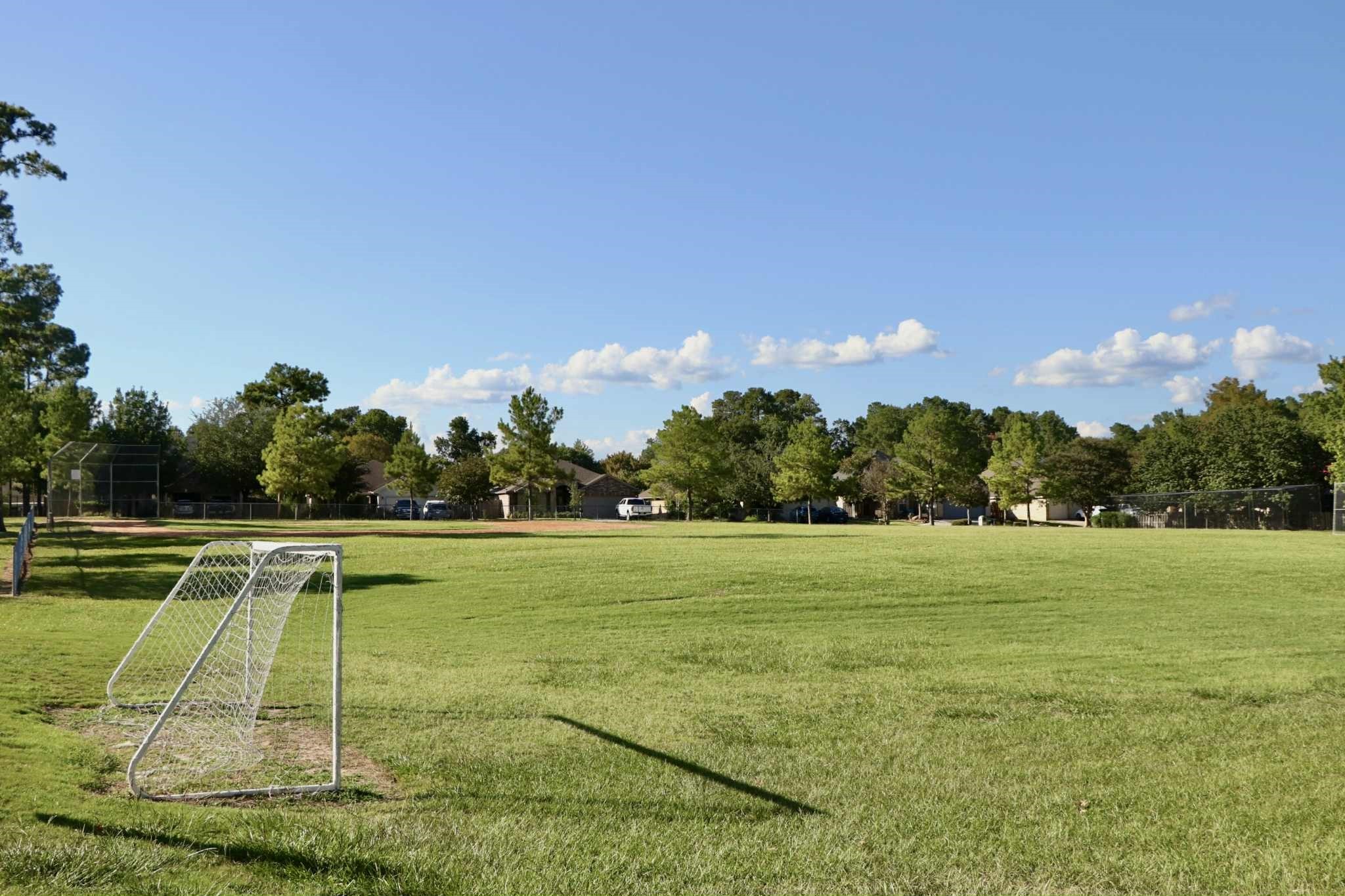 13151 Walden Road, Unit 142 Montgomery, TX 77356 - Photo 49 of 50 a view of a tennis court