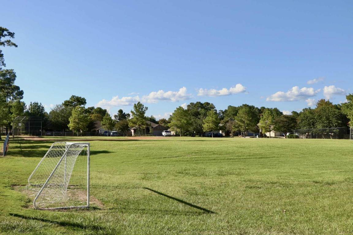 13151 Walden Road, Unit 142 Montgomery, TX 77356 - Photo 49 of 50 a view of a tennis court