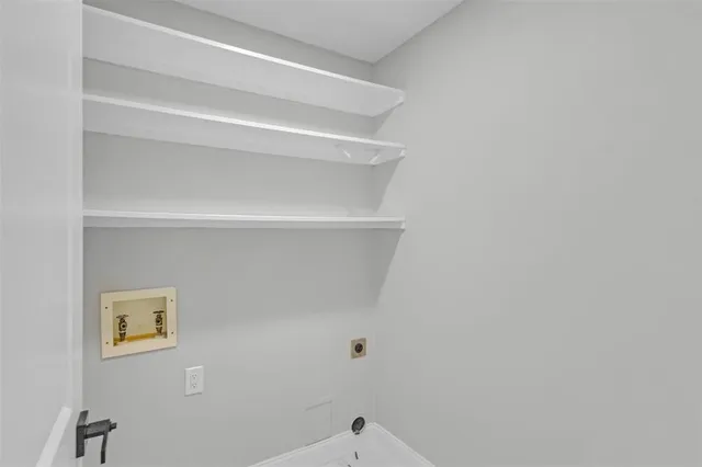 a view of small space with racks on the wall