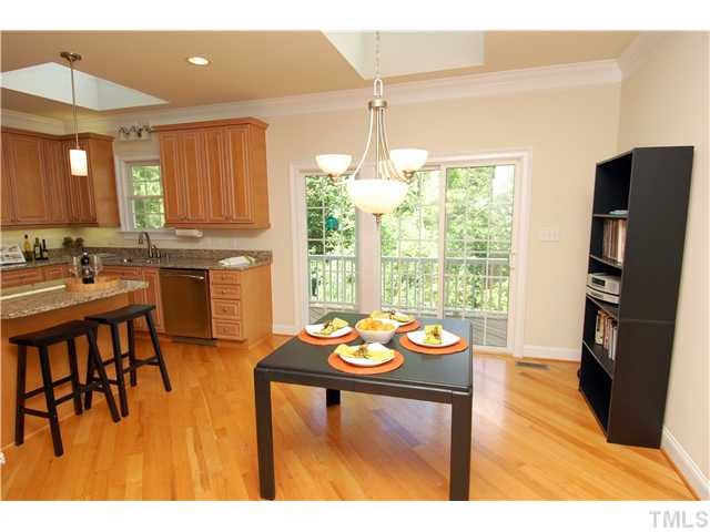 5308 Tallowtree Drive Raleigh, NC 27613 - Photo 9 of 25 Sunny and spacious breakfast nook with skylight above and lovely wooded views. Breakfast Area