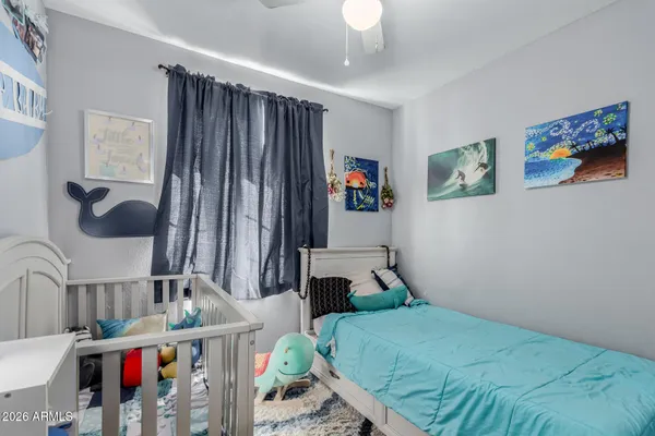 a bedroom with furniture and a bathtub