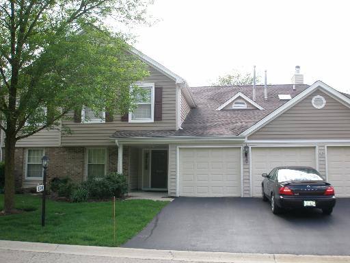 -n212 Windermere Road, Unit 2808 Winfield, IL 60190 - Photo 1 of 9 a car parked in front of a house