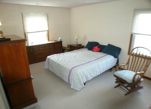 -n212 Windermere Road, Unit 2808 Winfield, IL 60190 - Photo 7 of 9 a spacious bedroom with a bed and a window