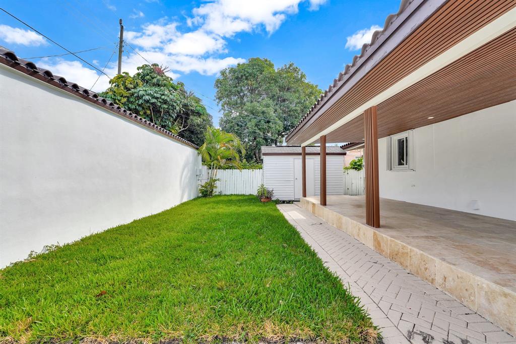 2291 Southwest 17th Street Miami, FL 33145 - Photo 14 of 86 a view of a back yard of the house