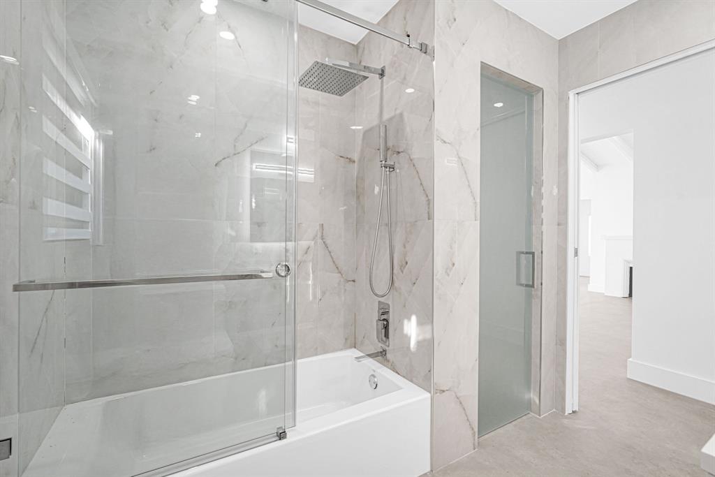 2291 Southwest 17th Street Miami, FL 33145 - Photo 34 of 86 a bathroom with a bathtub and a shower