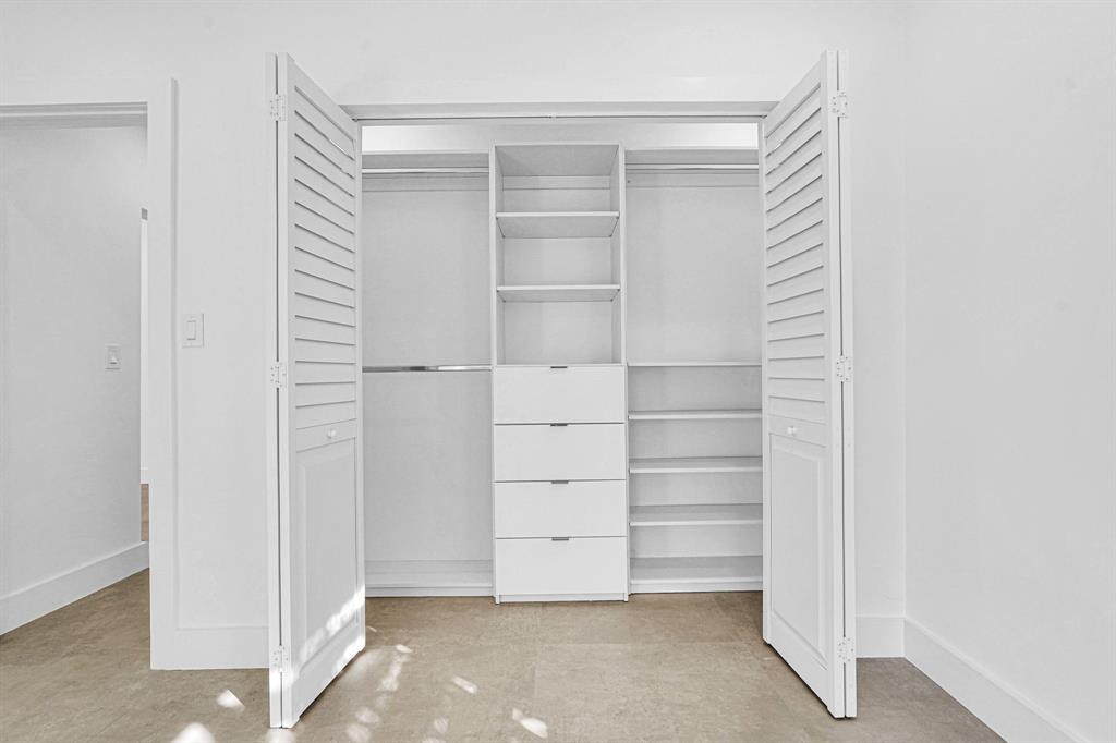 2291 Southwest 17th Street Miami, FL 33145 - Photo 47 of 86 a view of walk in closet with empty racks