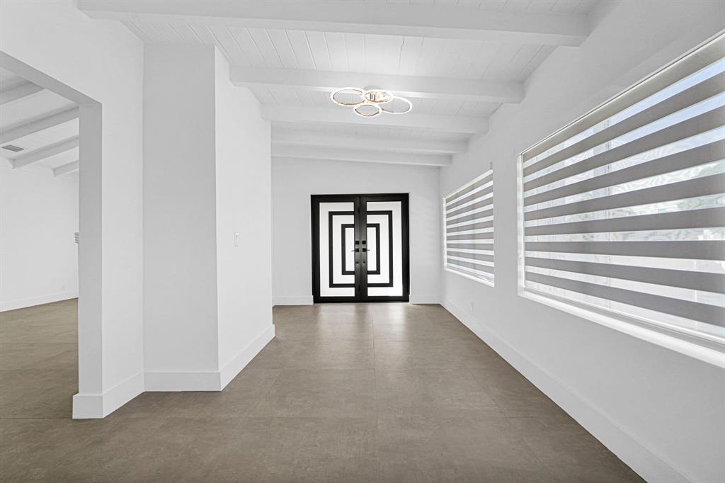 2291 Southwest 17th Street Miami, FL 33145 - Photo 59 of 86 a view of a hallway with a window