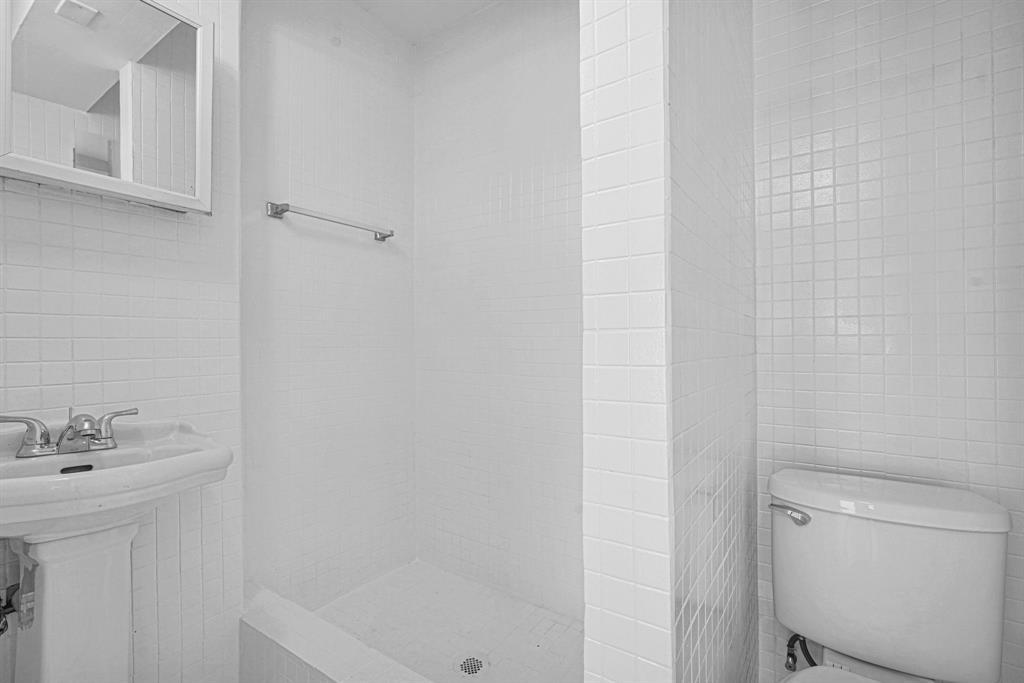 2291 Southwest 17th Street Miami, FL 33145 - Photo 71 of 86 a bathroom with a sink a toilet and shower