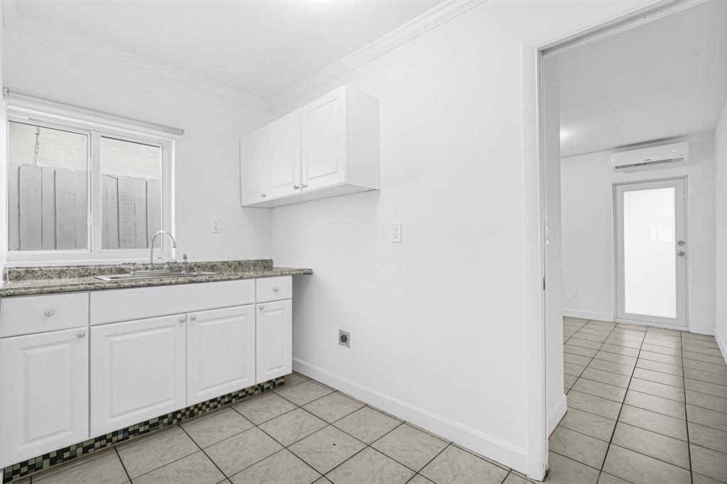 2291 Southwest 17th Street Miami, FL 33145 - Photo 74 of 86 a bathroom with a sink and a mirror