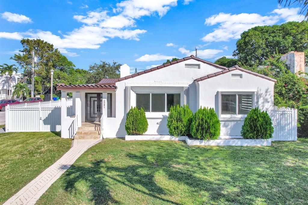 2291 Southwest 17th Street Miami, FL 33145 - Photo 84 of 86 a front view of house with yard and green space
