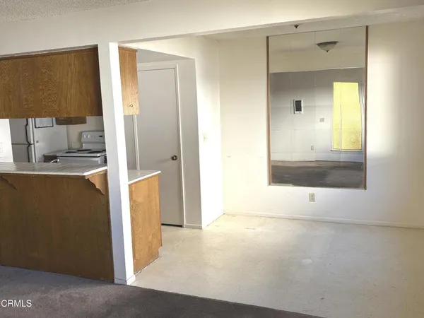 a view of a bathroom with mirror
