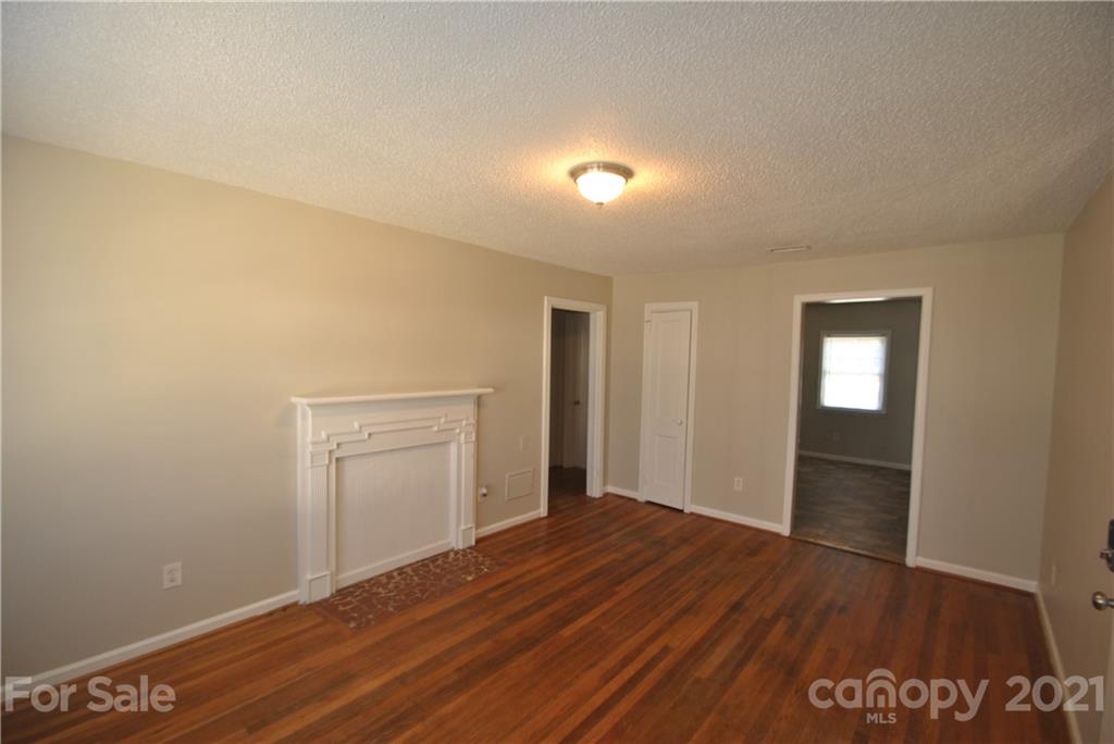 2812 Mayflower Road Charlotte, NC 28208 - Photo 4 of 7 a view of a livingroom with wooden floor