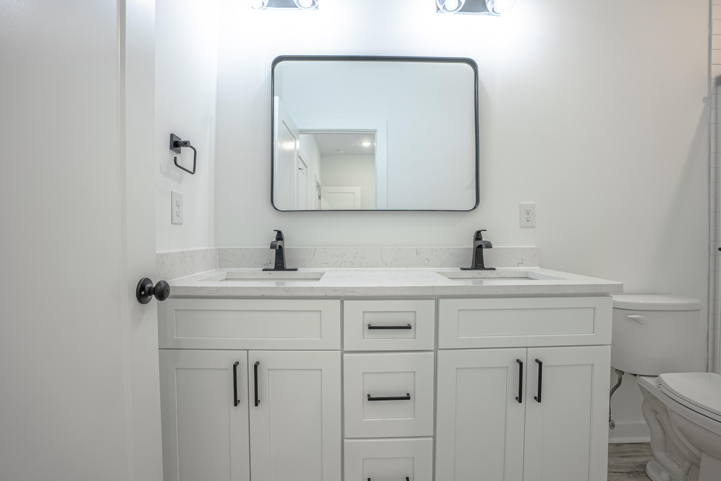 2351 Dumajack Road Chipley, FL 32428 - Photo 15 of 31 a bathroom with a sink vanity and mirror