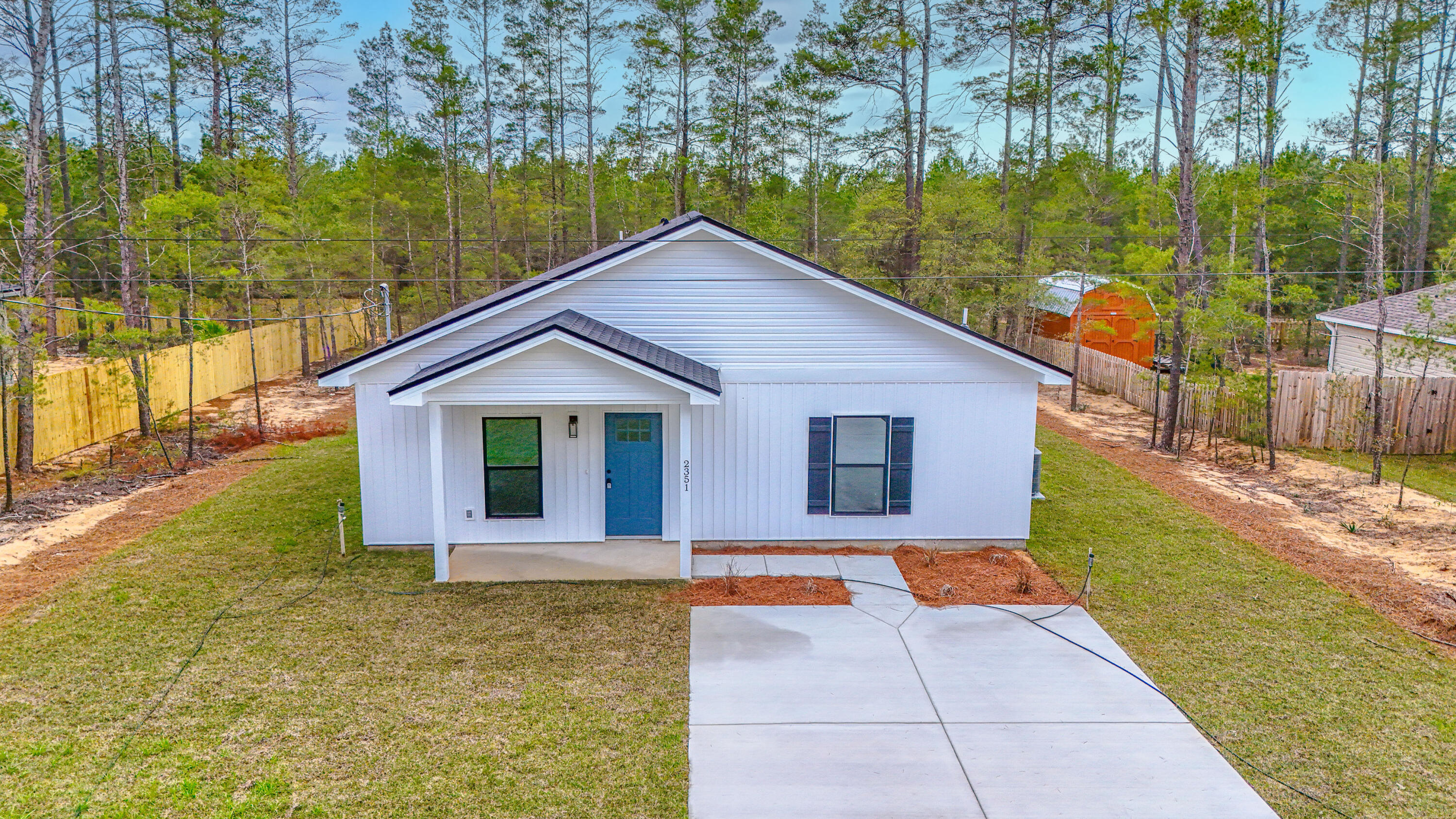 2351 Dumajack Road Chipley, FL 32428 - Photo 2 of 31 a view of backyard of house with green space