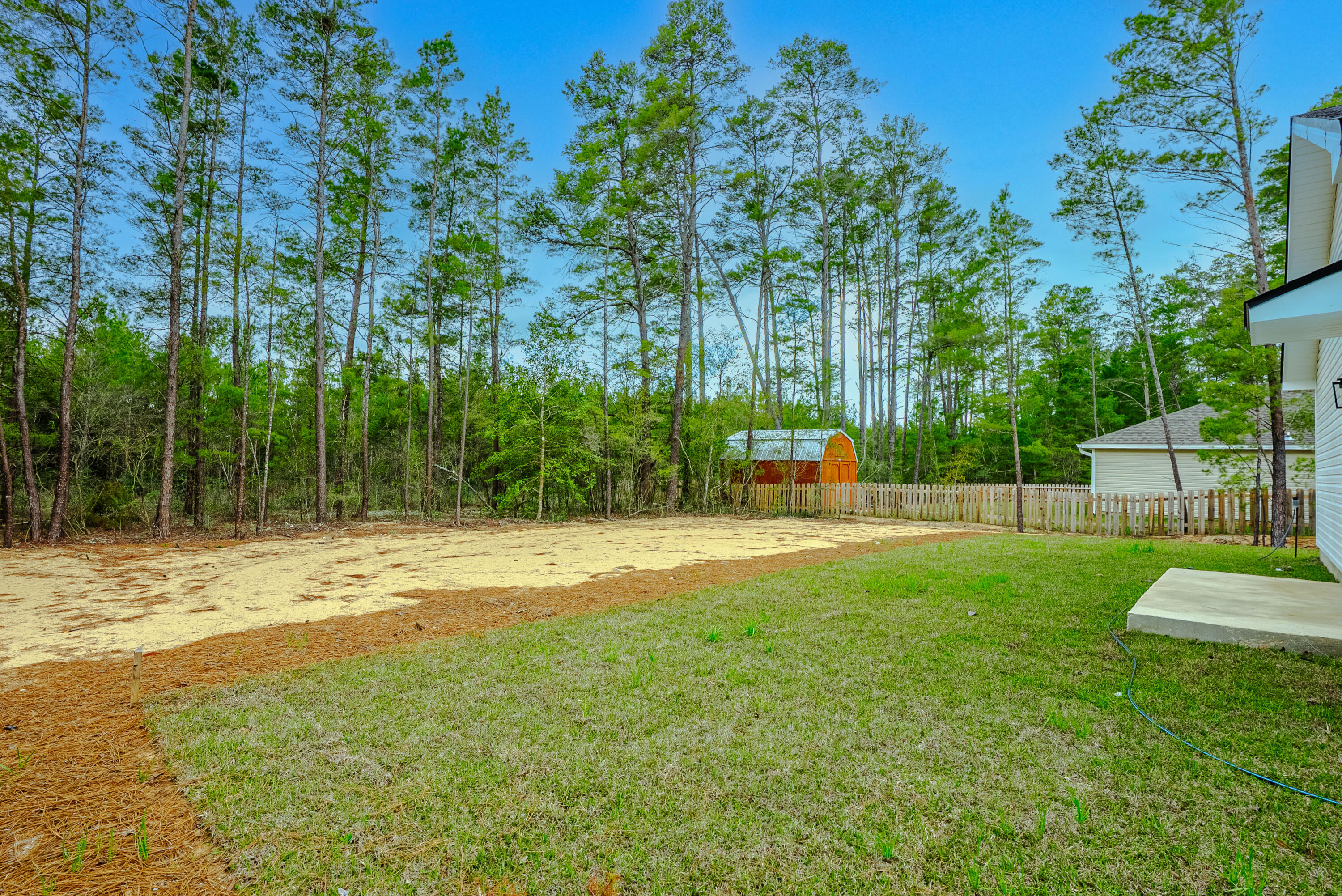 2351 Dumajack Road Chipley, FL 32428 - Photo 21 of 31 a view of a yard with a large trees