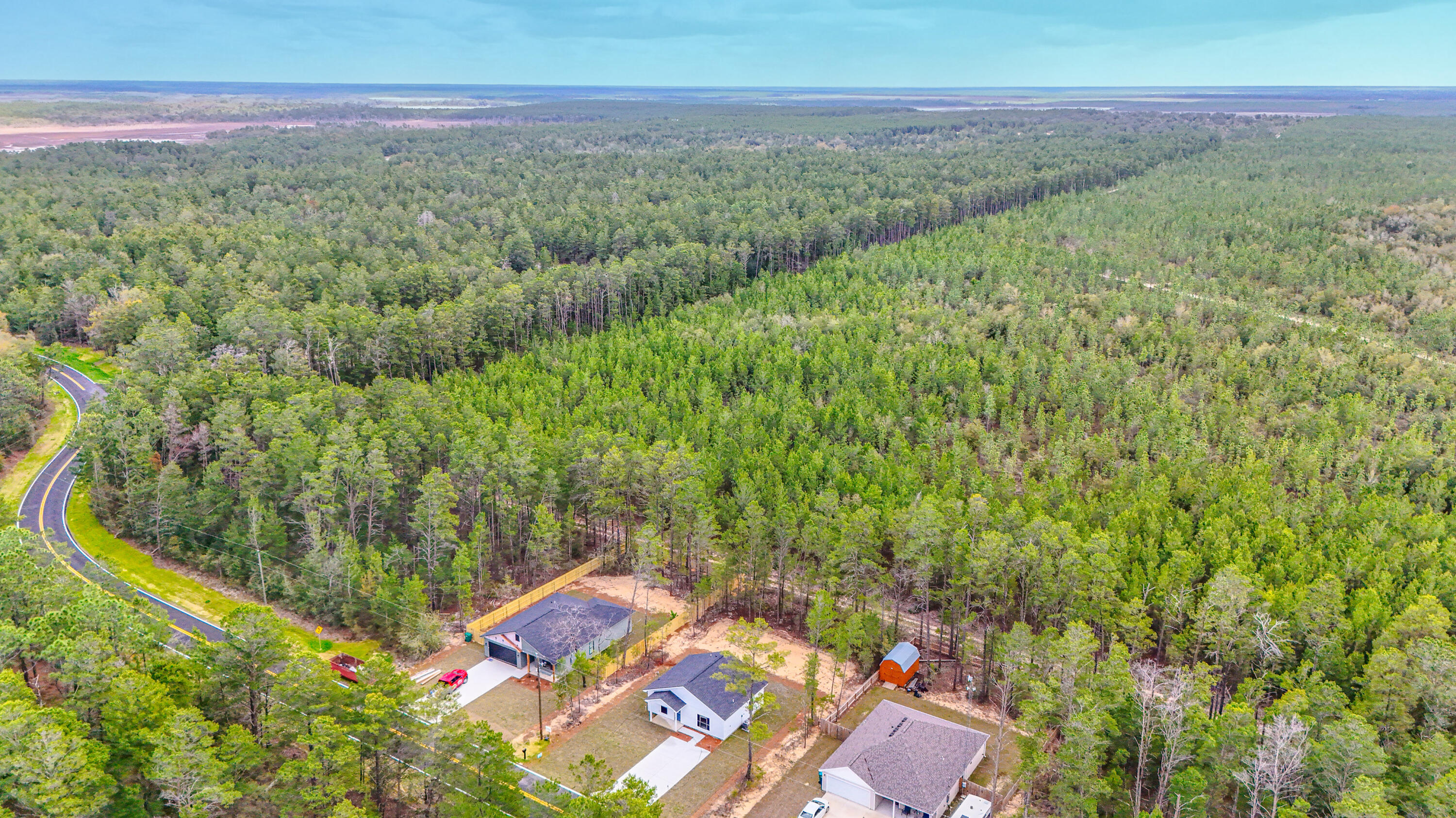 2351 Dumajack Road Chipley, FL 32428 - Photo 25 of 31 a view of a yard with an outdoor seating