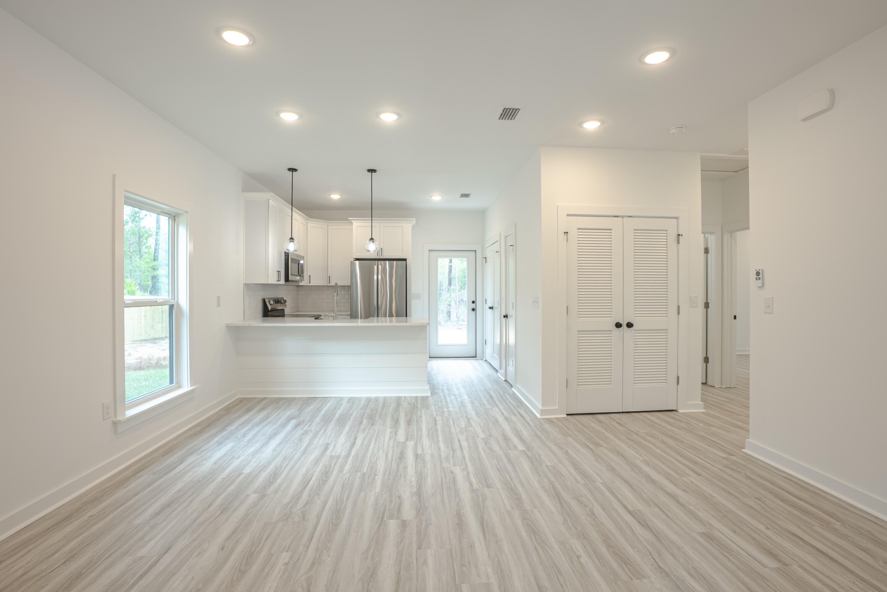 2351 Dumajack Road Chipley, FL 32428 - Photo 3 of 31 a view of kitchen with wooden floor