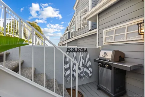 a view of yard from terrace with seating space