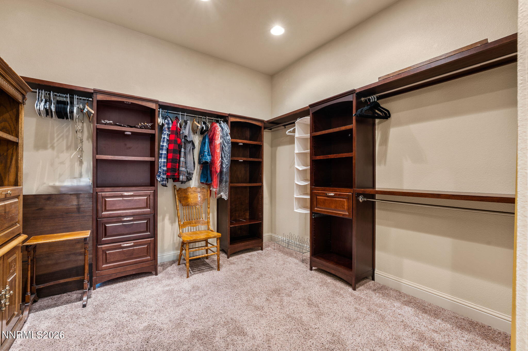 10170 Vía Como Reno, NV 89511 - Photo 26 of 85 a view of walk in closet with clothes and shoes
