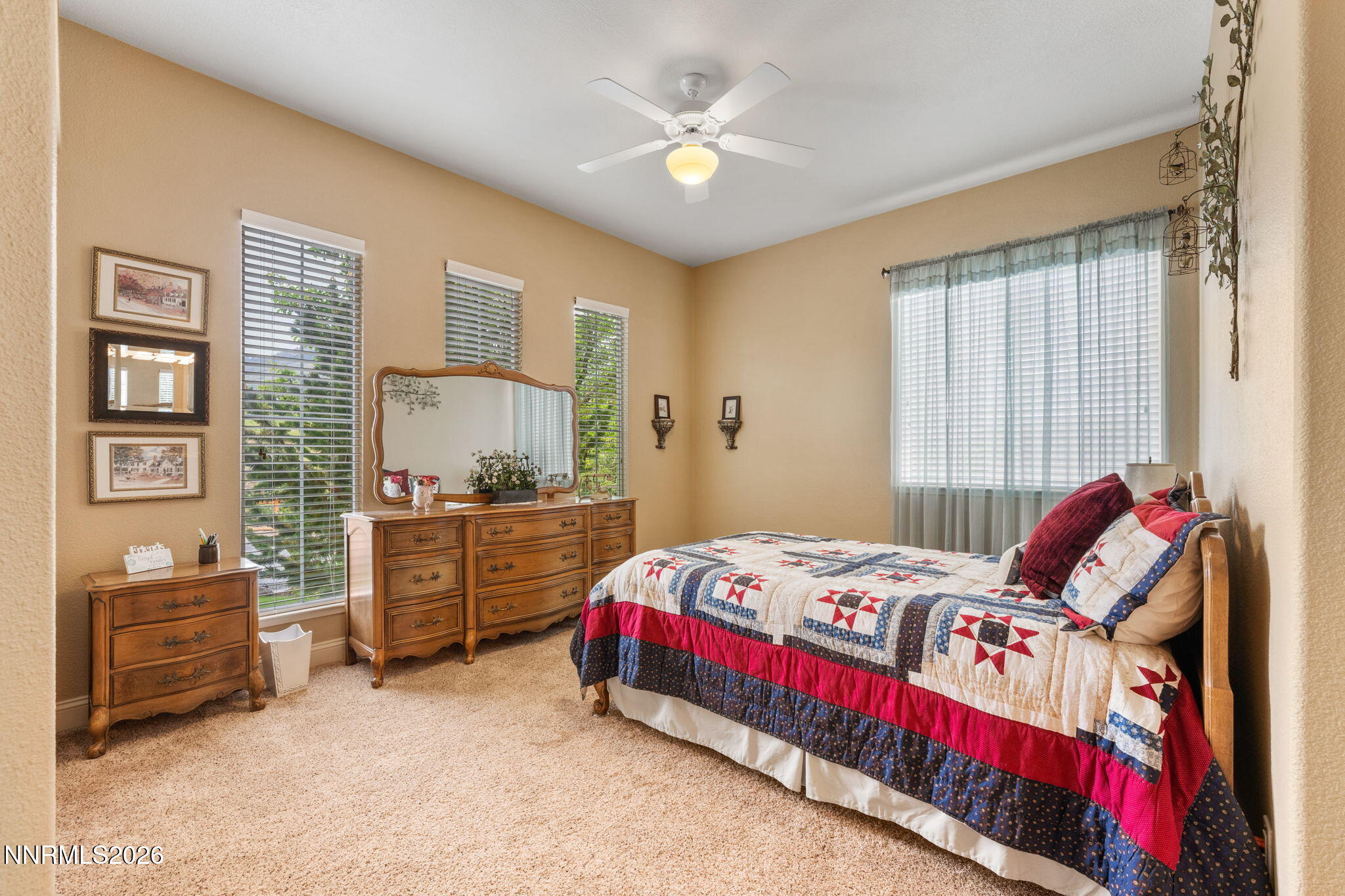 10170 Vía Como Reno, NV 89511 - Photo 28 of 85 a bedroom with a bed and a cabinets