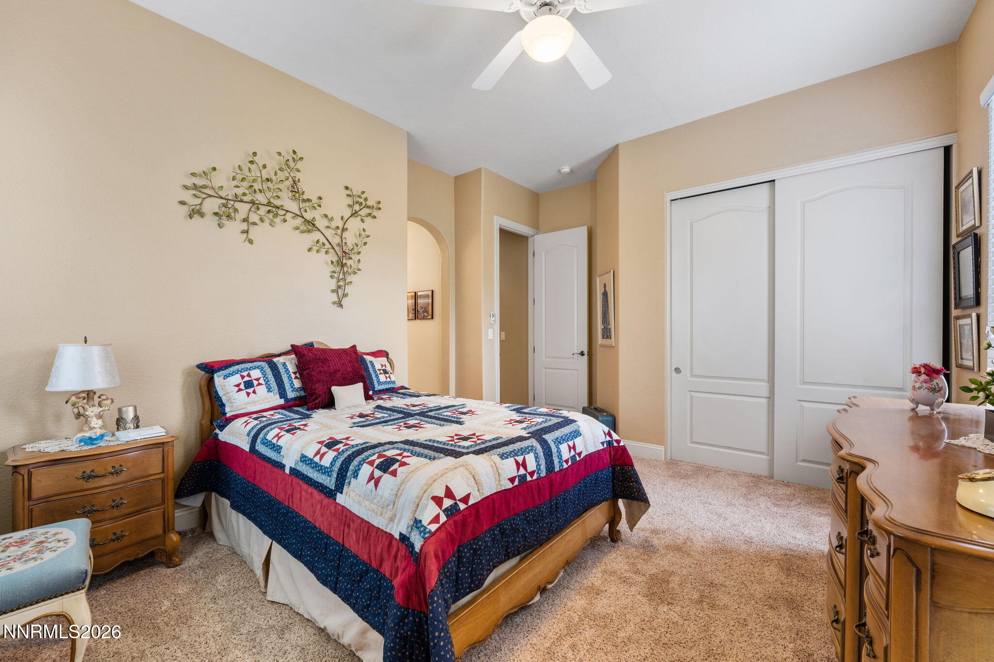 10170 Vía Como Reno, NV 89511 - Photo 29 of 85 a bedroom with a bed and a table in it