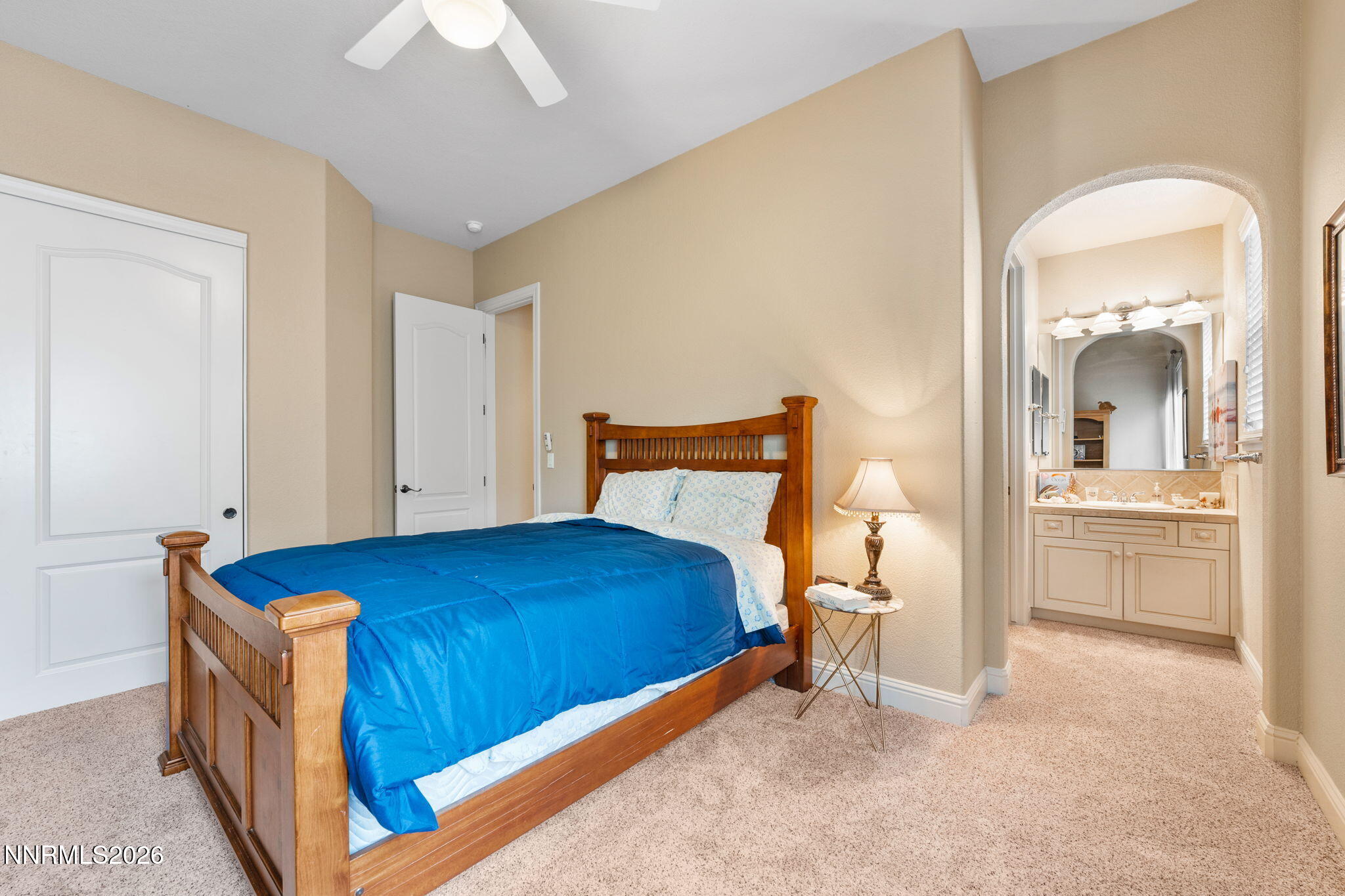 10170 Vía Como Reno, NV 89511 - Photo 31 of 85 a bedroom with a bed and a view of bathroom