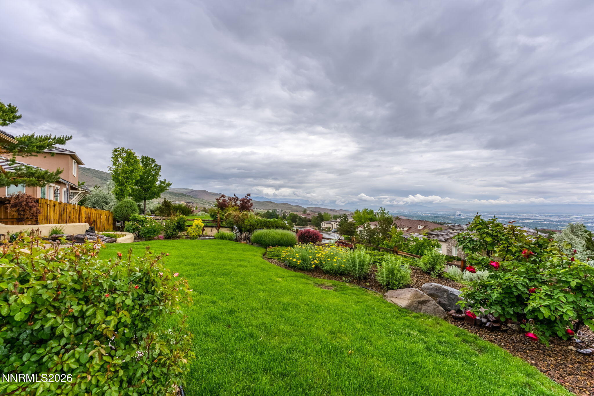 10170 Vía Como Reno, NV 89511 - Photo 55 of 85 a view of a garden with a building in front of it