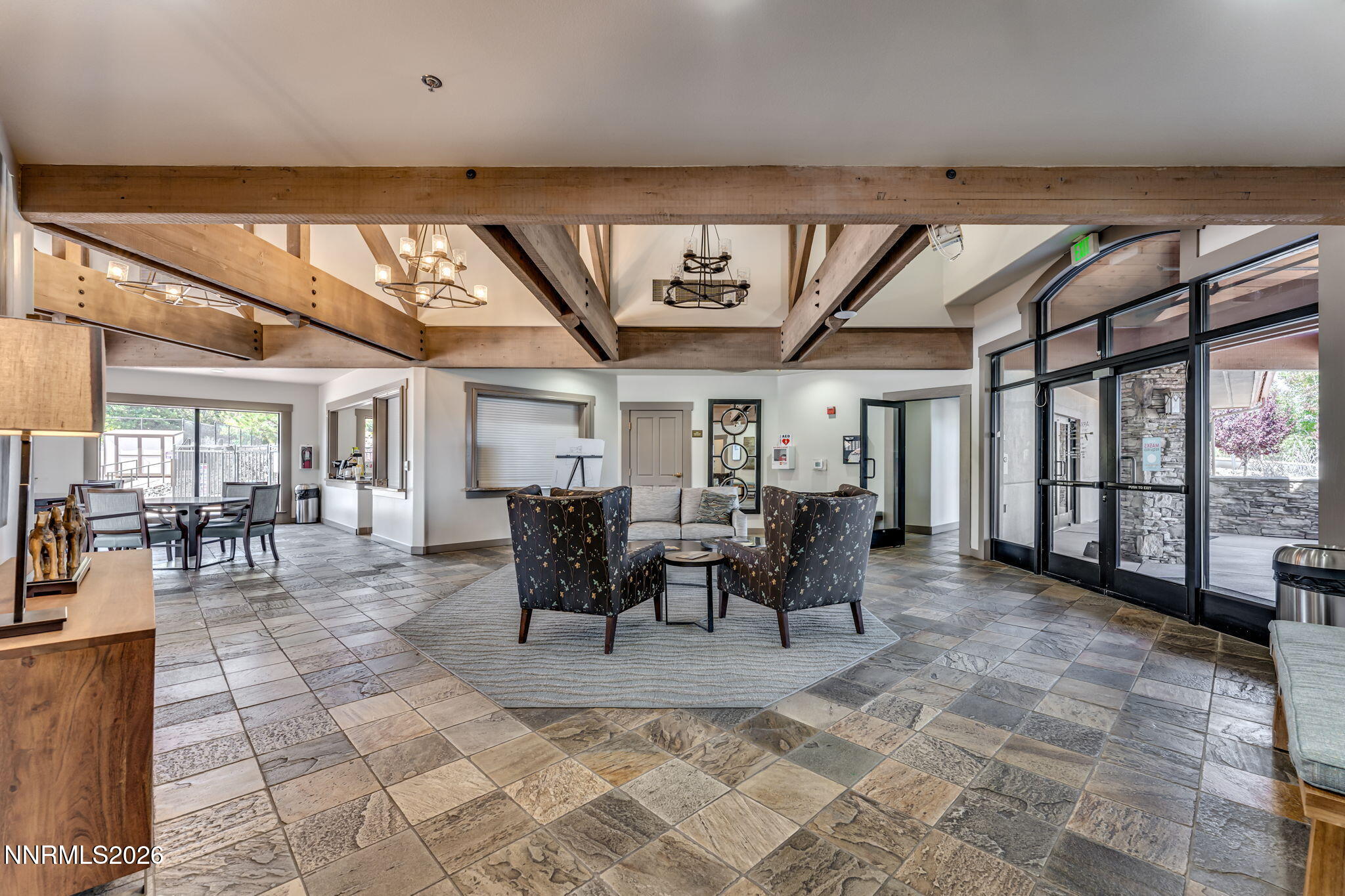 10170 Vía Como Reno, NV 89511 - Photo 80 of 85 a outdoor space with lots of tables a large window and chairs