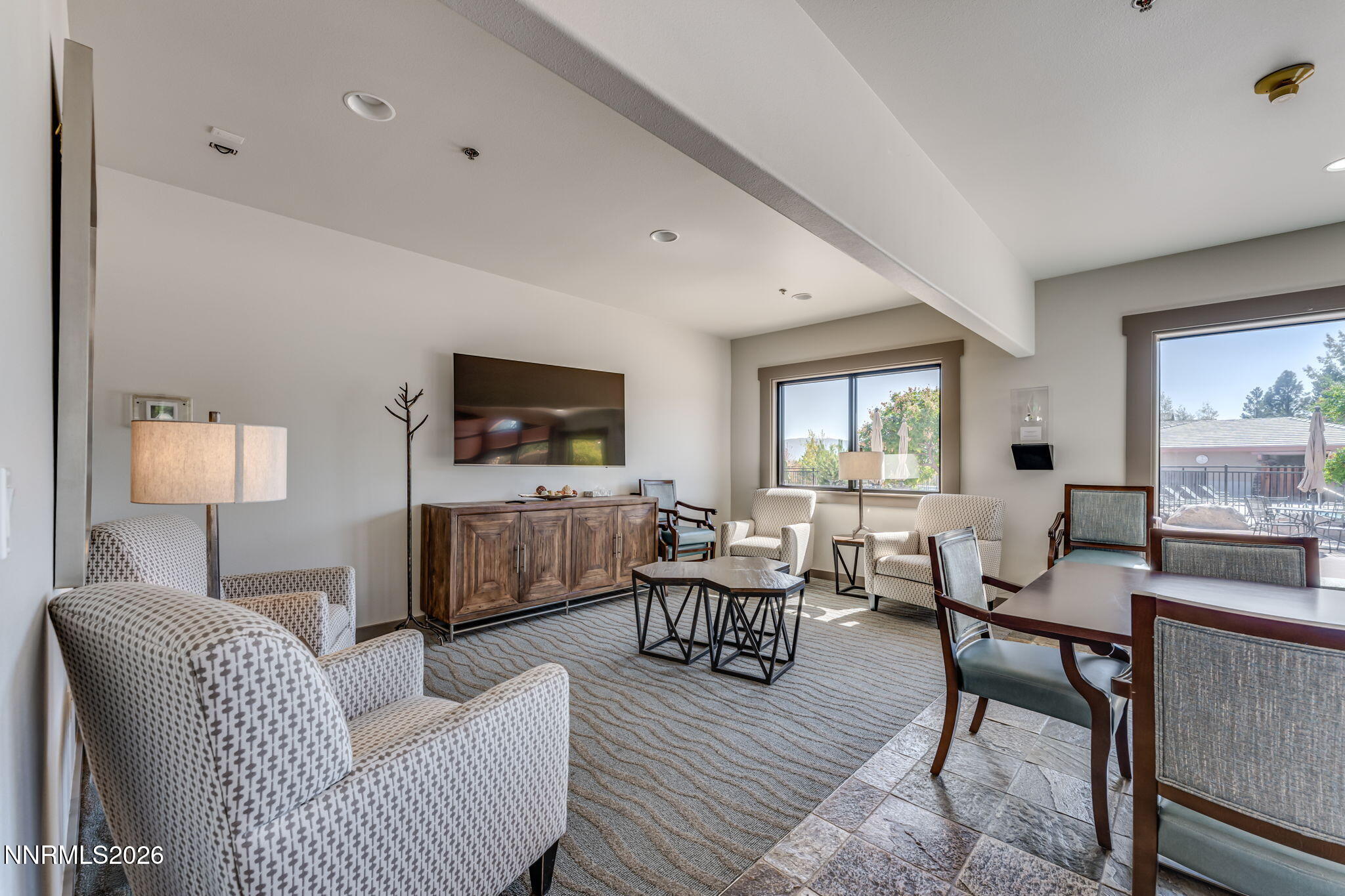 10170 Vía Como Reno, NV 89511 - Photo 83 of 85 a living room with furniture a flat screen tv and a window
