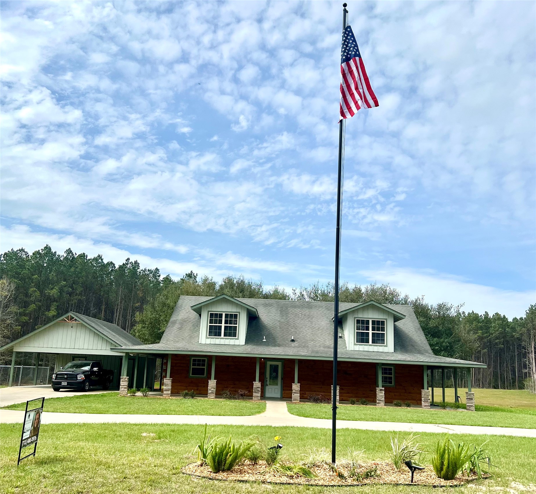 335 Walding Road Livingston, TX 77351 - Photo 1 of 23 a front view of a house with a garden