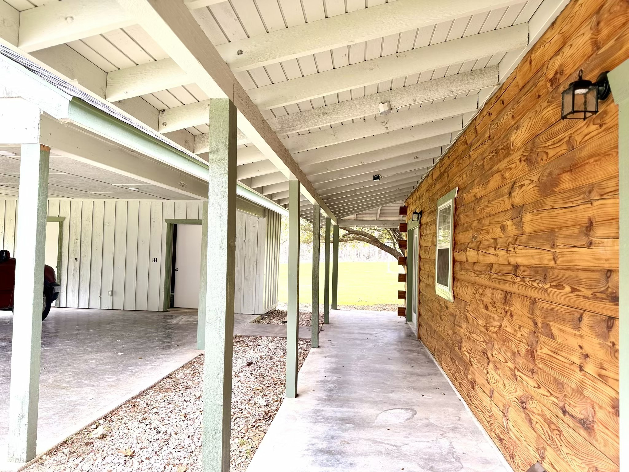 335 Walding Road Livingston, TX 77351 - Photo 22 of 23 a view of hallway with wooden floor and door
