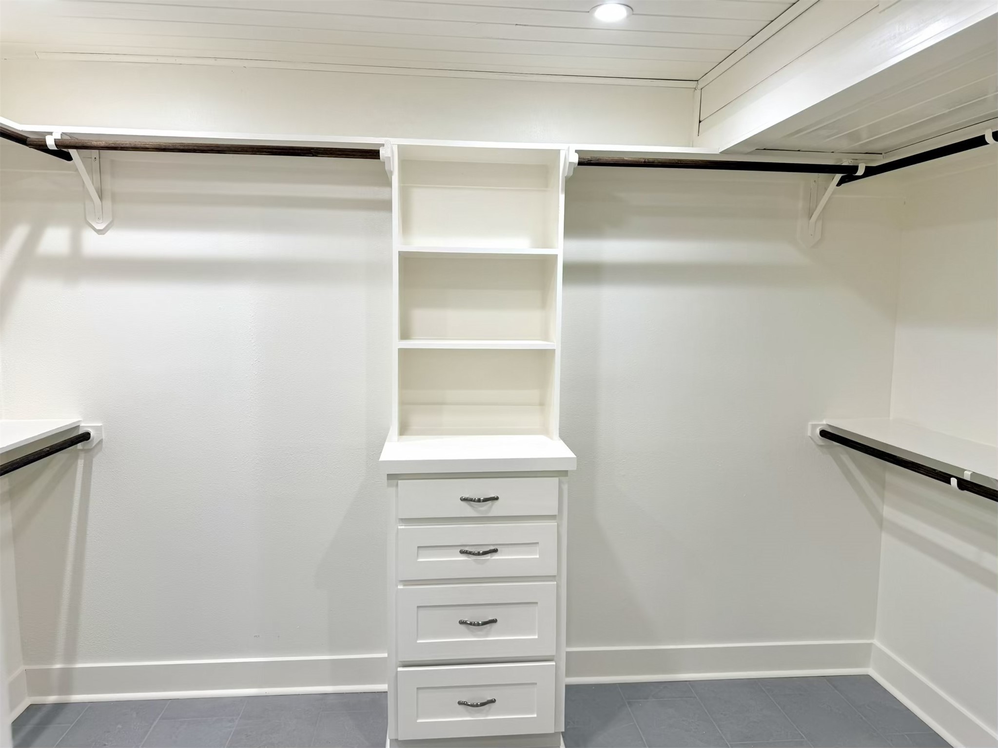 335 Walding Road Livingston, TX 77351 - Photo 9 of 23 a view of walk in closet with empty racks