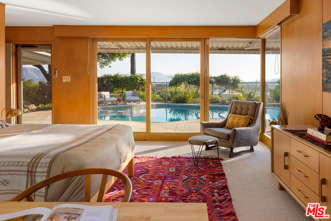 526 Hunter Drive Fillmore, CA 93015 - Photo 14 of 32 a bedroom with furniture and large window