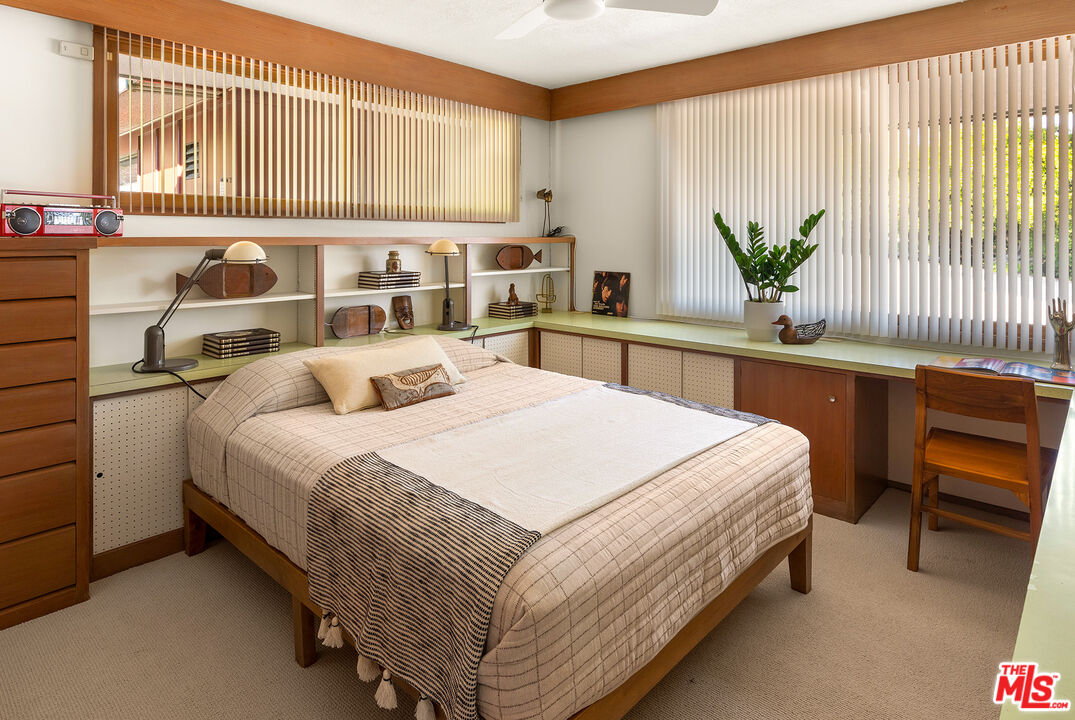 526 Hunter Drive Fillmore, CA 93015 - Photo 23 of 32 a large bed sitting in a bedroom next to a window