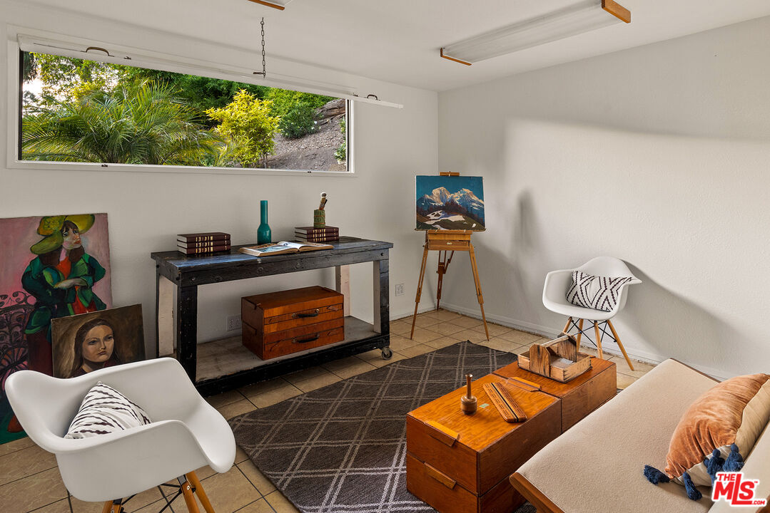 526 Hunter Drive Fillmore, CA 93015 - Photo 25 of 32 a bedroom with furniture and a fireplace