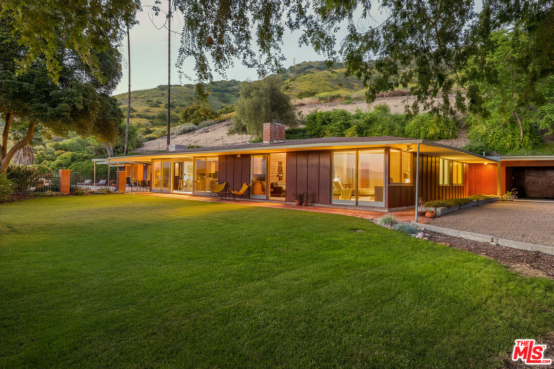 526 Hunter Drive Fillmore, CA 93015 - Photo 26 of 32 a view of a house with backyard and porch