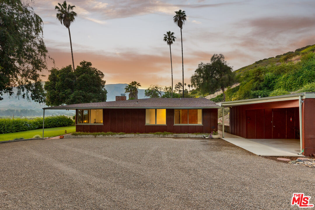 526 Hunter Drive Fillmore, CA 93015 - Photo 28 of 32 a front view of a house with a yard and garage