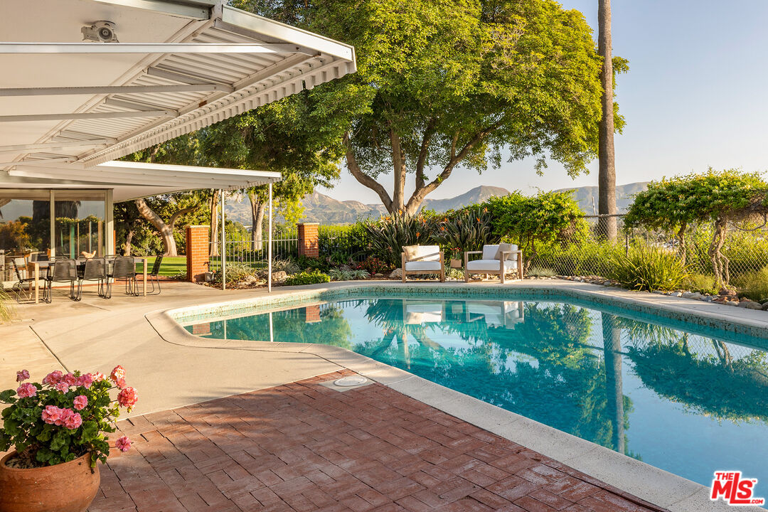 526 Hunter Drive Fillmore, CA 93015 - Photo 3 of 32 a view of swimming pool with a patio