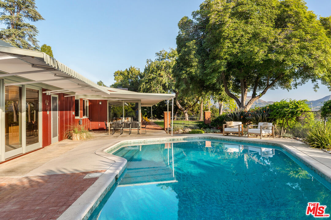 526 Hunter Drive Fillmore, CA 93015 - Photo 4 of 32 a view of a house with swimming pool and sitting area