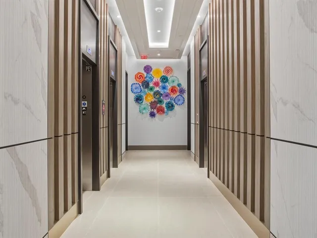 a kitchen that has a sink and a stove in it