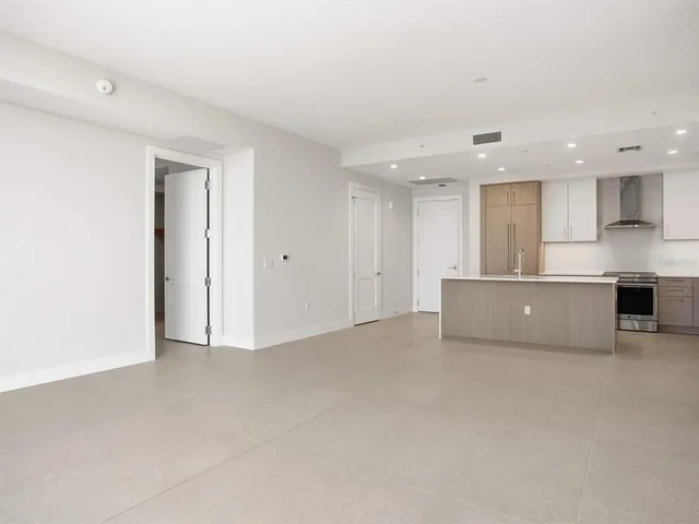 a room with pool table and a fireplace