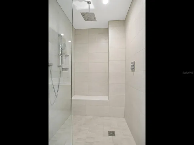 a patio with a table and chairs