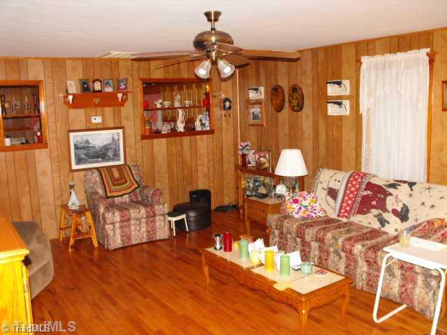1016 Golden Road State Road, NC 28676 - Photo 8 of 11 Living Room. THE LR AND BRs HAVE BEAUTIFUL OAK FLOORS.