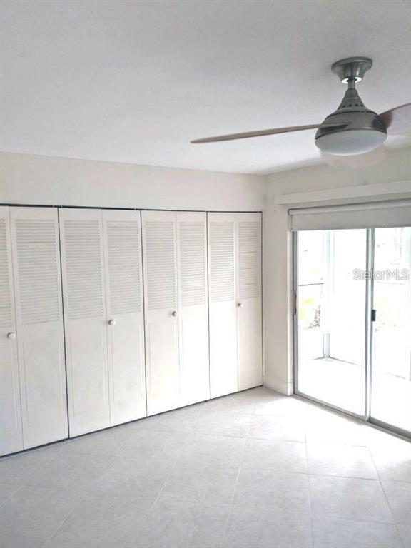 201 Bedford Trail, Unit F127 Sun City Center, FL 33573 - Photo 11 of 15 a view of an empty room with a window