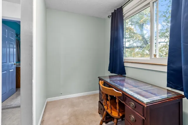 a room with furniture and window