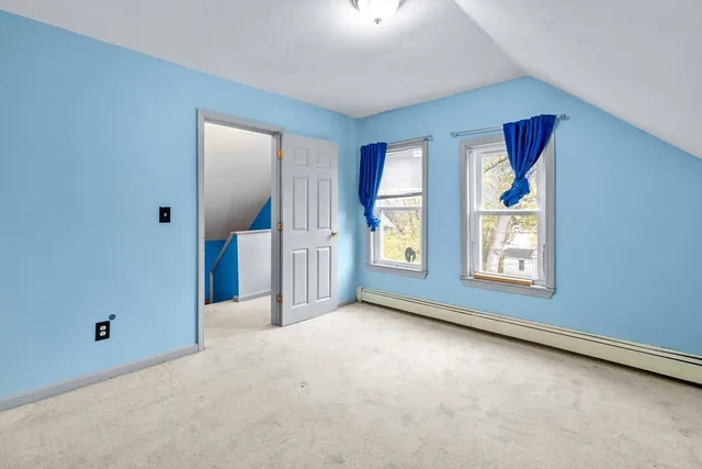 a view of a livingroom with a staircase