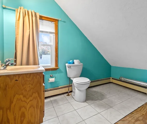 a bathroom with a sink and a toilet