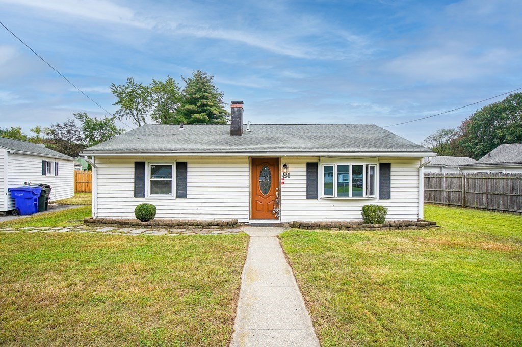 81 Pembroke Circle Springfield, MA 01104 - Photo 1 of 14 a house view with a sitting space and garden