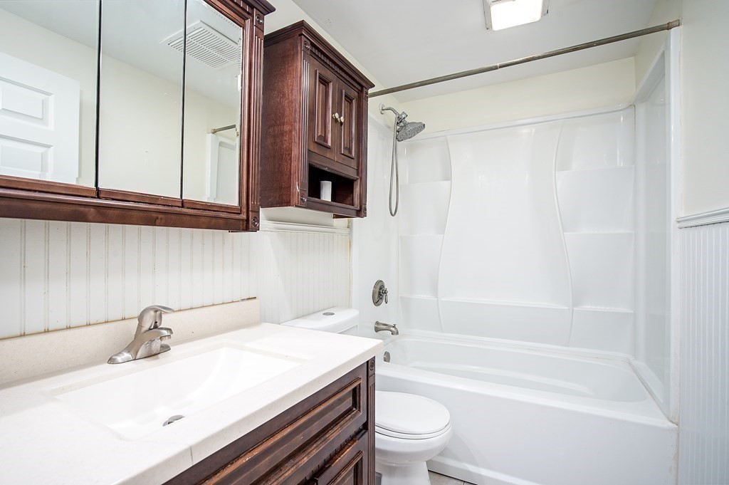 81 Pembroke Circle Springfield, MA 01104 - Photo 12 of 14 a bathroom with a sink a toilet and bathtub