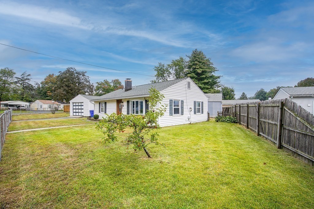 81 Pembroke Circle Springfield, MA 01104 - Photo 13 of 14 a front view of house with yard and swimming pool